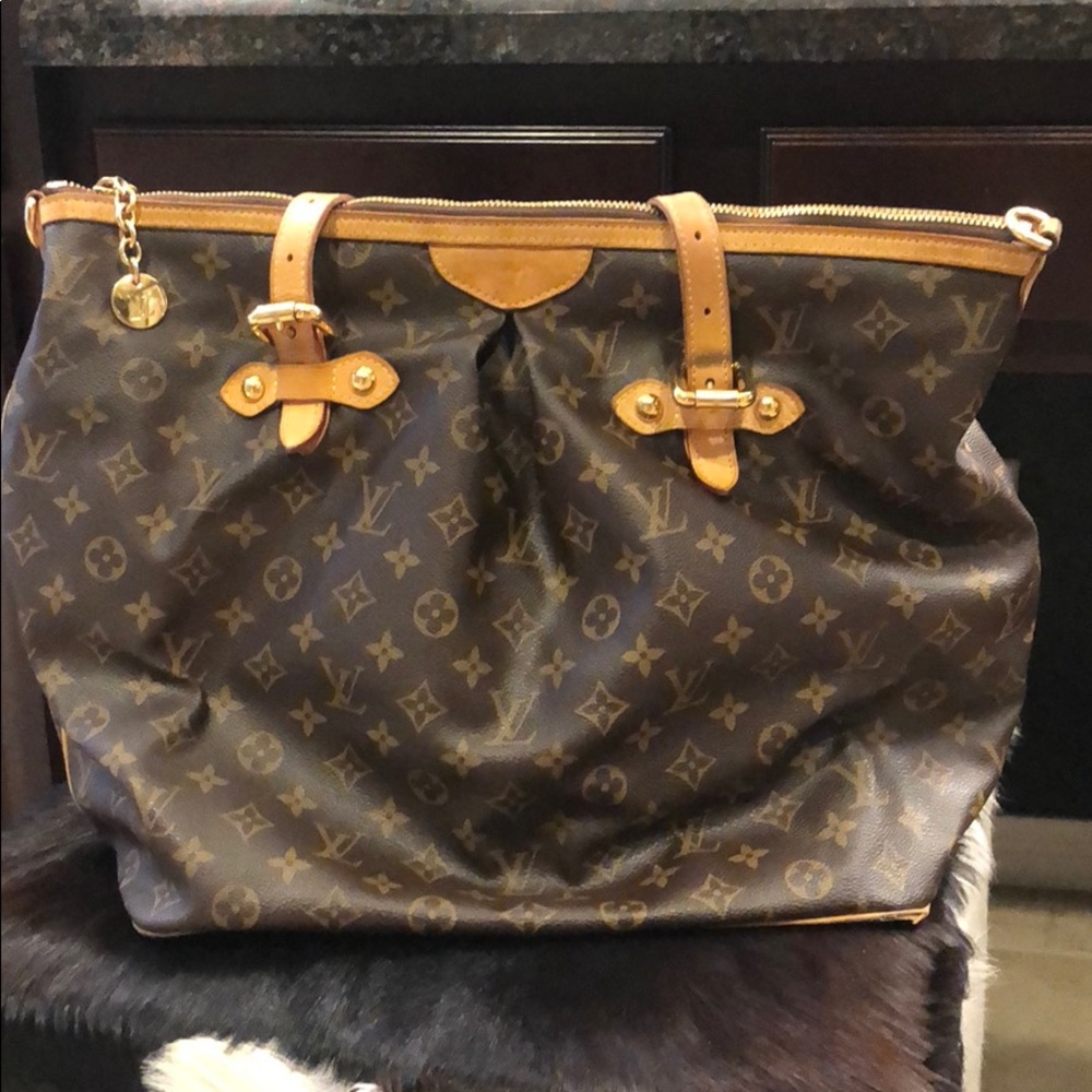 Louis Vuitton over the shoulder zipper bag